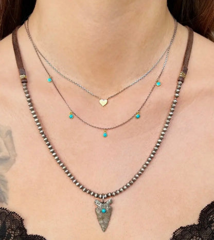 CLP Jewelry - 14k Tiny Gold Heart On Delicate
Sterling Silver Chain