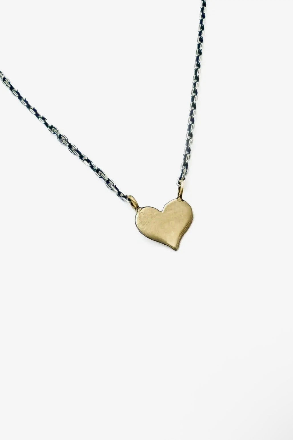 CLP Jewelry - 14k Tiny Gold Heart On Delicate
Sterling Silver Chain